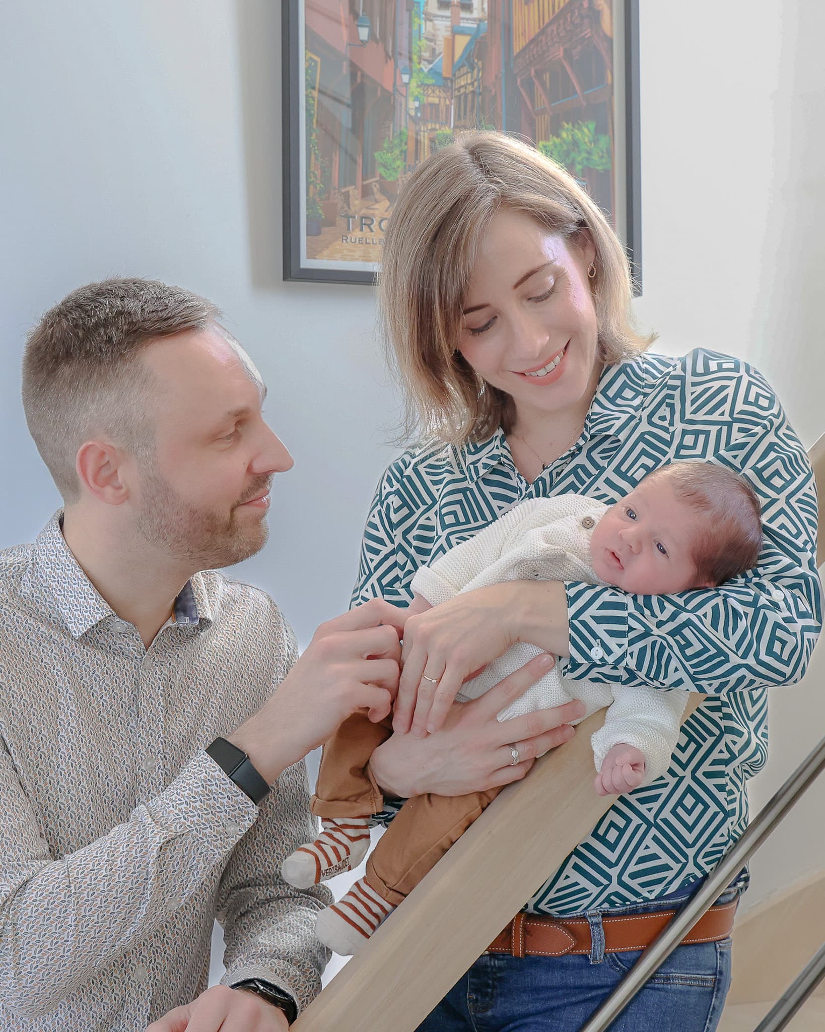 Séance photo famille avec nouveau-né à domicile